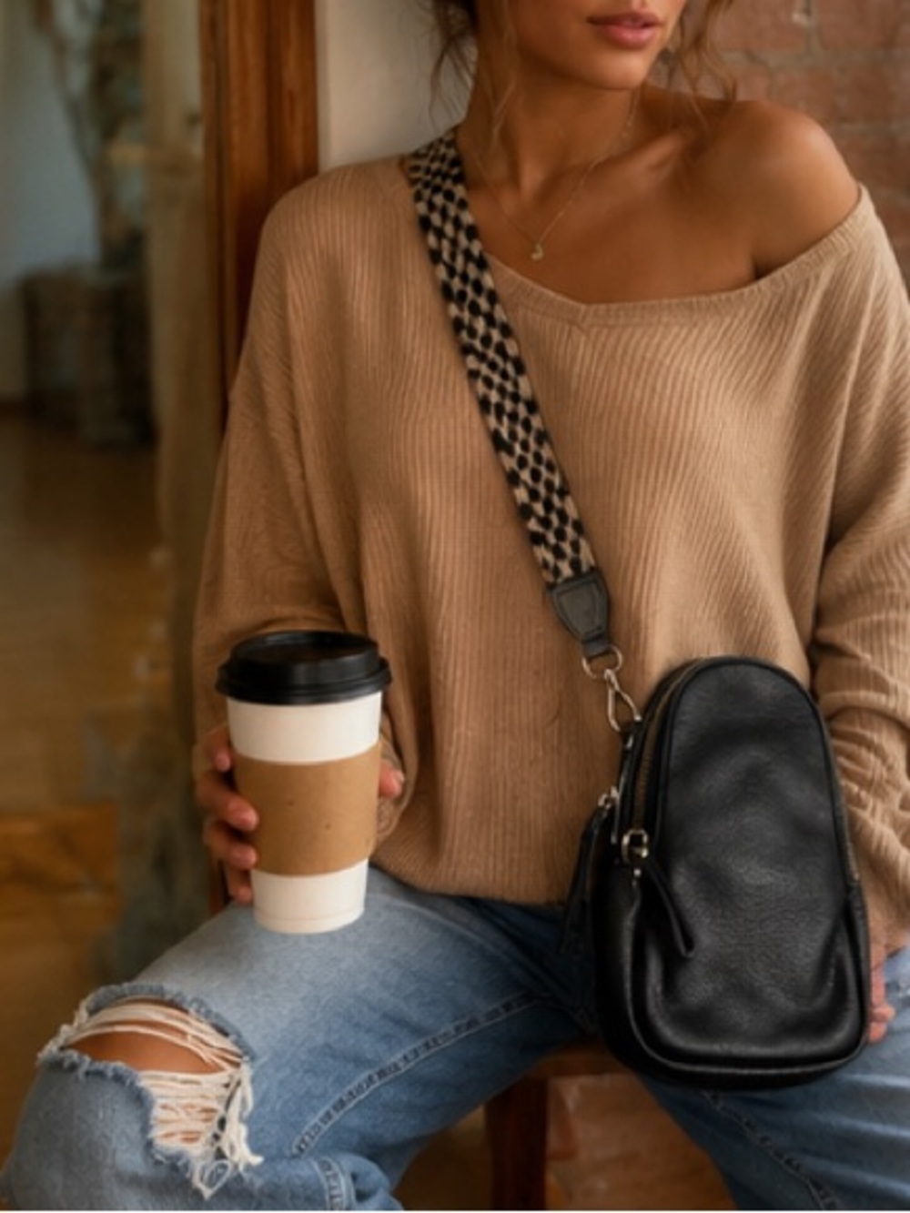 Anthropologie — Black faux Leather sling Bag with fabric Checkered Strap